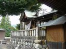 熊野神社石造透塀越しに見える本殿